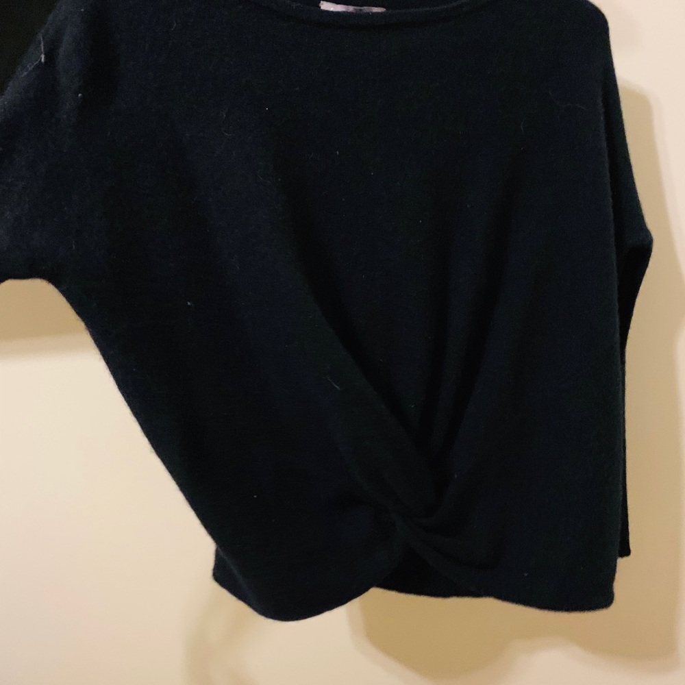 Black sweater with knot detailing in front
